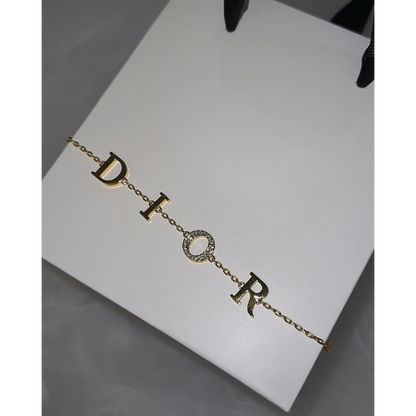 Dorée - Monogram Gold Embrace